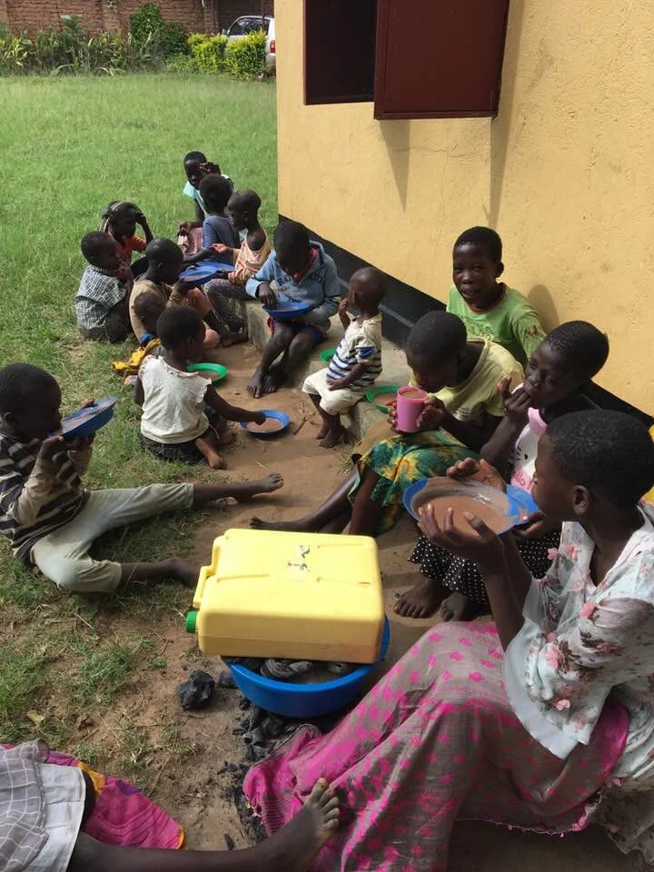 Kids eating millet porridge for breakfast