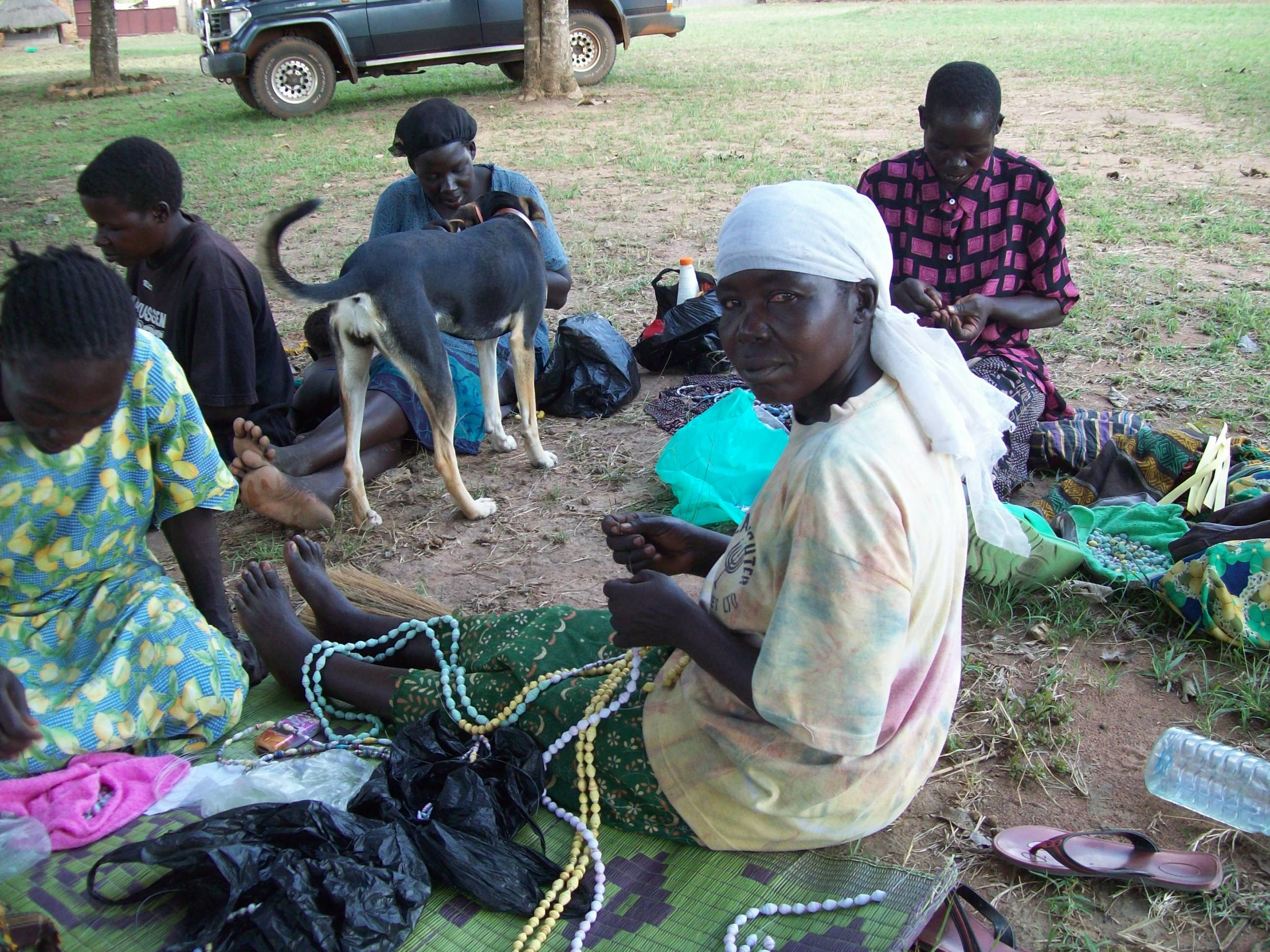 widows making beads need for adminstration building no tables or chairs copy.jpg