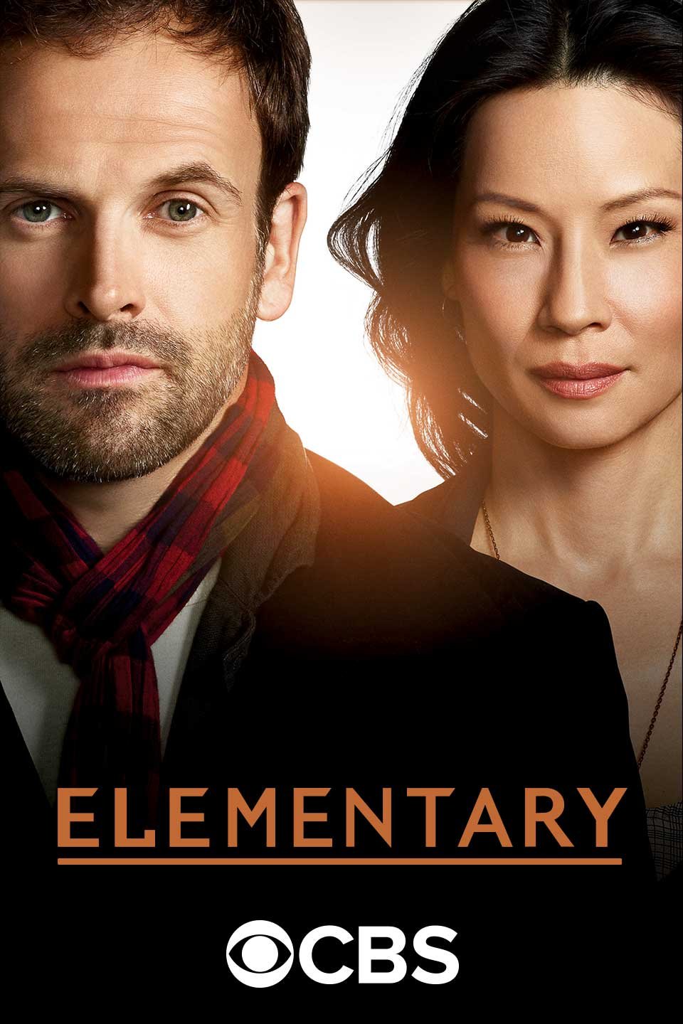 Close-up of a man and woman, both looking directly at the camera, with the title "Elementary" and CBS logo at the bottom.