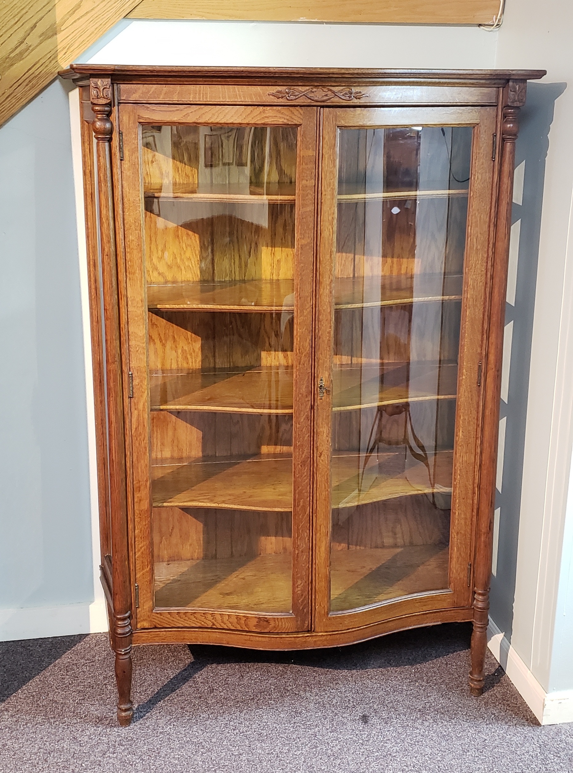 Early 1900s Oak Curio W Curved Glass Doors And Carvings Ardesh