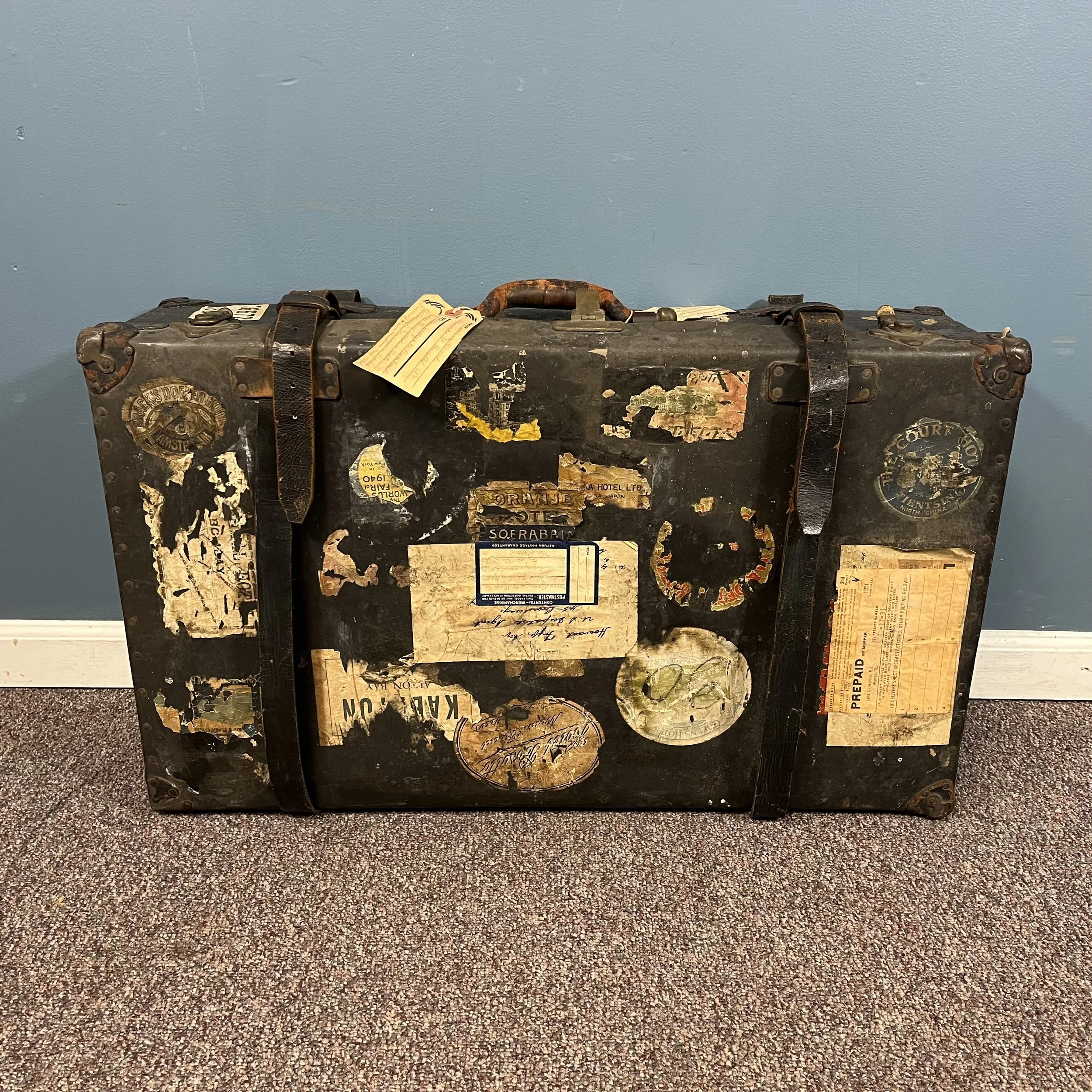 Well Traveled Leather Suitcase — Ardesh