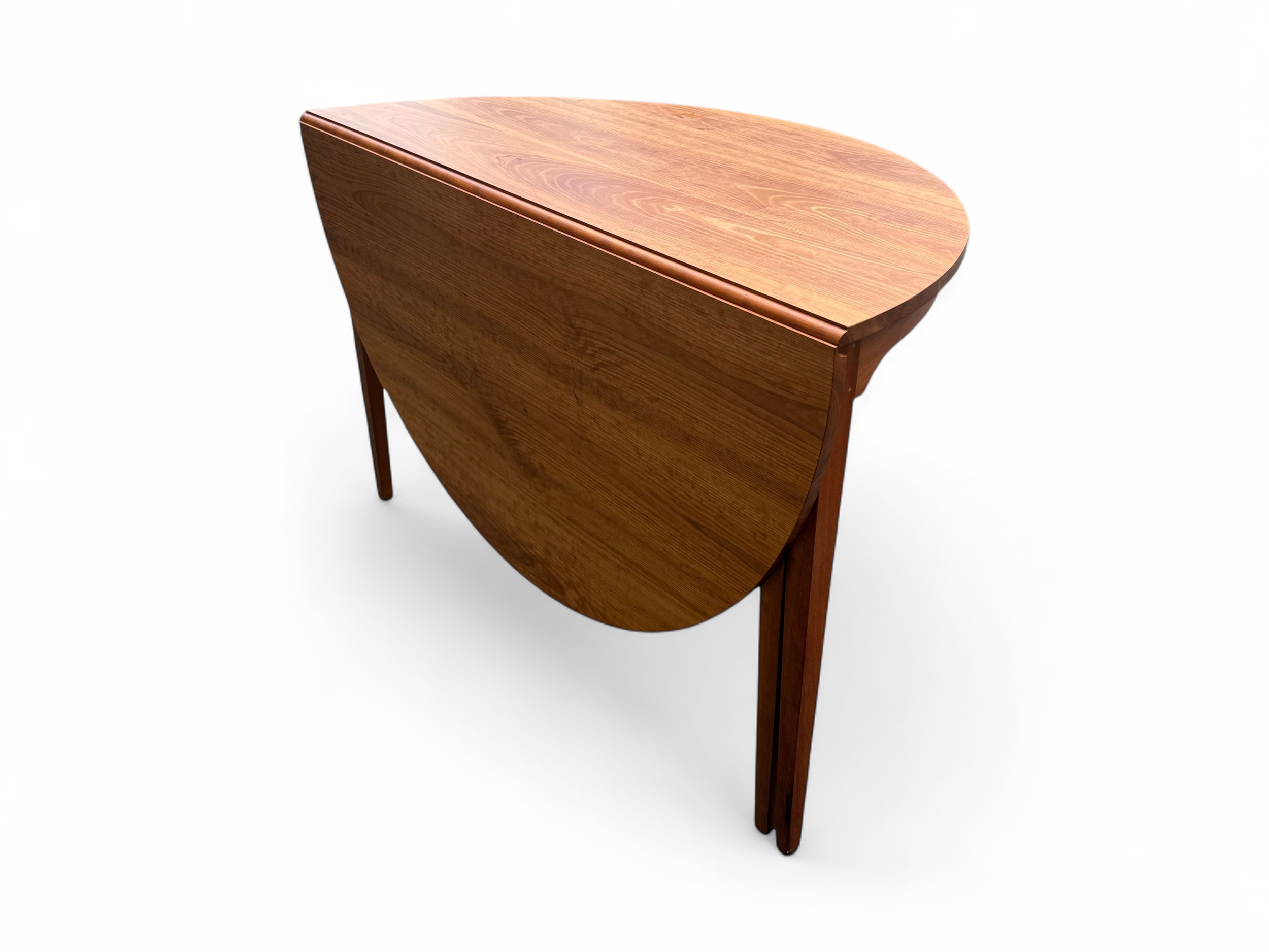 thomas-moser-thomas-moser-mid-century-cherry-round-extendable-dining-table-4-1793117025478.png