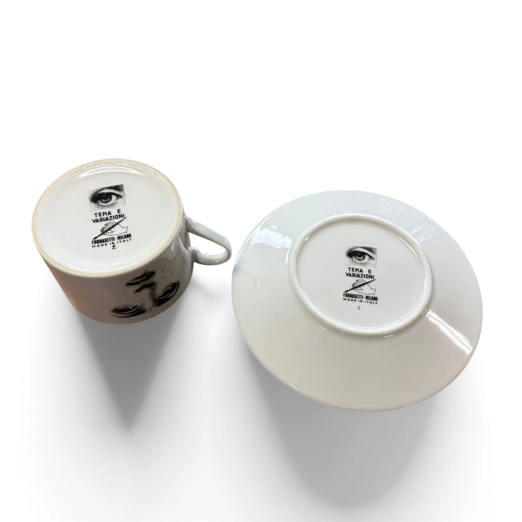 fornasetti-fornasetti-tema-e-variazioni-il-fumo-fa-male-tea-cup-saucer-4-1793127652460.jpg