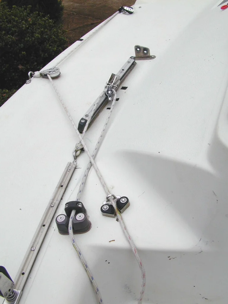 Aft Lowers ArrangementAft lowers 1 - Adjustable aft lower track made from old original main traveler track.