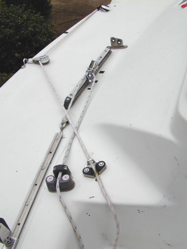 Aft Lowers Arrangement Aft lowers 1 - Adjustable aft lower track made from old original main traveler track.
