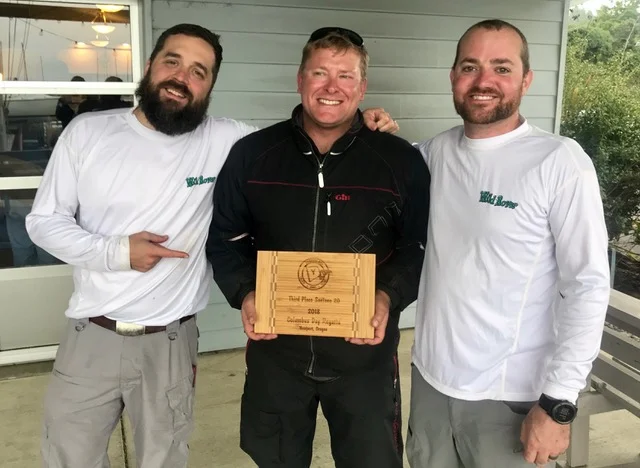 3rd Place: Michael Tieman on Wild Rover with Andy Bailey (left) Eric Redmond (right)