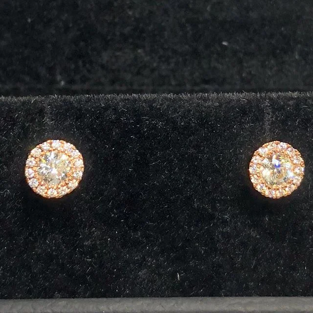 14 Karat Rose Gold Diamond Studs with a Diamond Halo