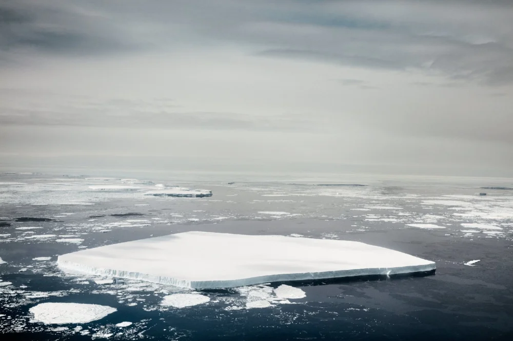 This massive chunk of free-floating sea ice is about 100 ft. thick from waterline to top—or roughly the height of a 10-story building. Courtesy of Time.
