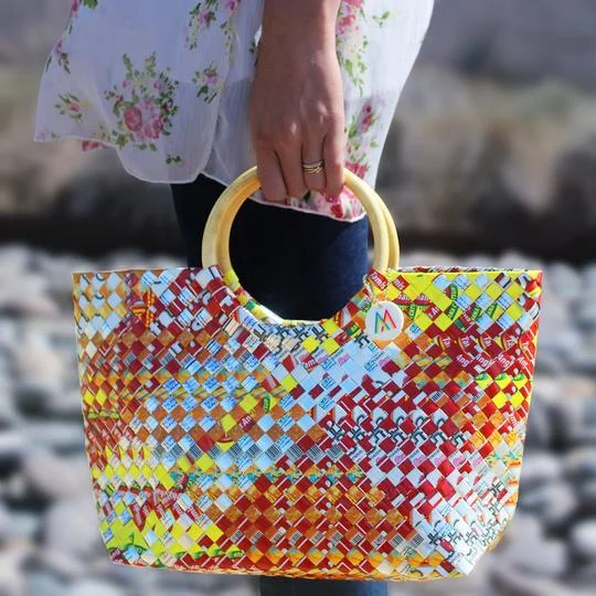 Mother Erth empowers artisan moms and reduces plastic pollution. "Sustainability woven into fashion."