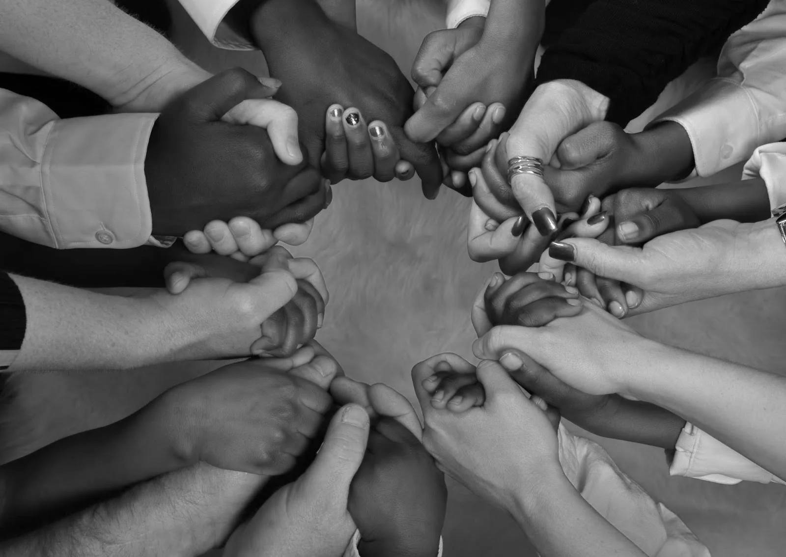 multi+racial+hands+together+holding+praying+agreement+unity+Copyright+of++Brett+Jorgensenshutterstockcom_109195817.jpg