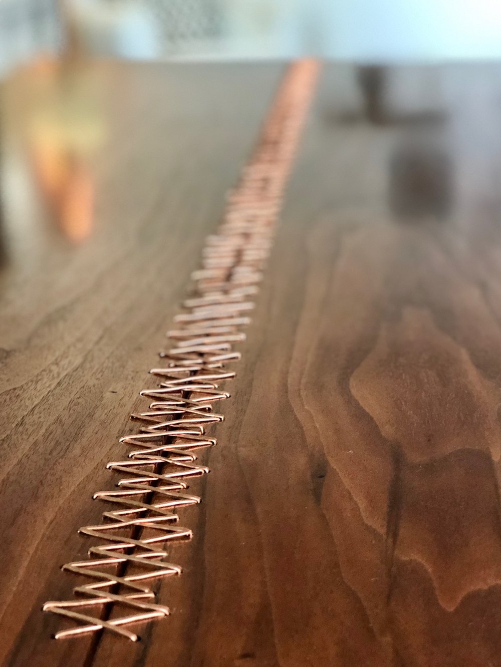 live edge walnut copper laced kitchen table with live edge walnut bench mid century modern furniture Sallie Plumley Studio Richmond Virginia Sally Plumley Custom Woodworking and Furniture Design