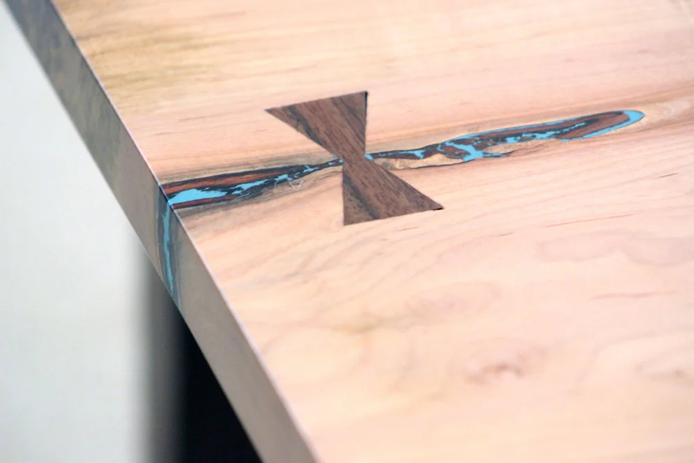 Custom live edge maple coffee table game table with bowtie and inlay mid century modern furniture Sallie Plumley Studio Richmond Virginia Sally Plumley Custom Woodworking and Furniture Design