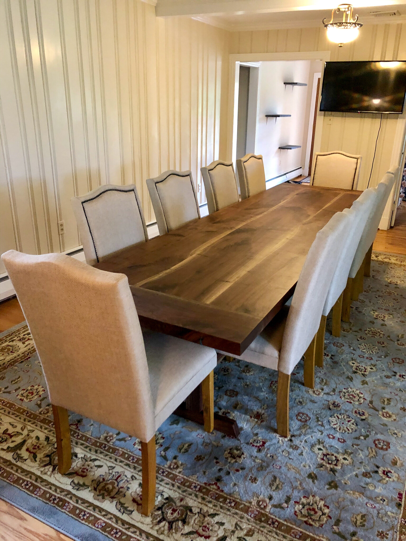 11 foot walnut trestle table with breadboard end and blue epoxy details. Sallie Plumley Studio richmond Virginia 