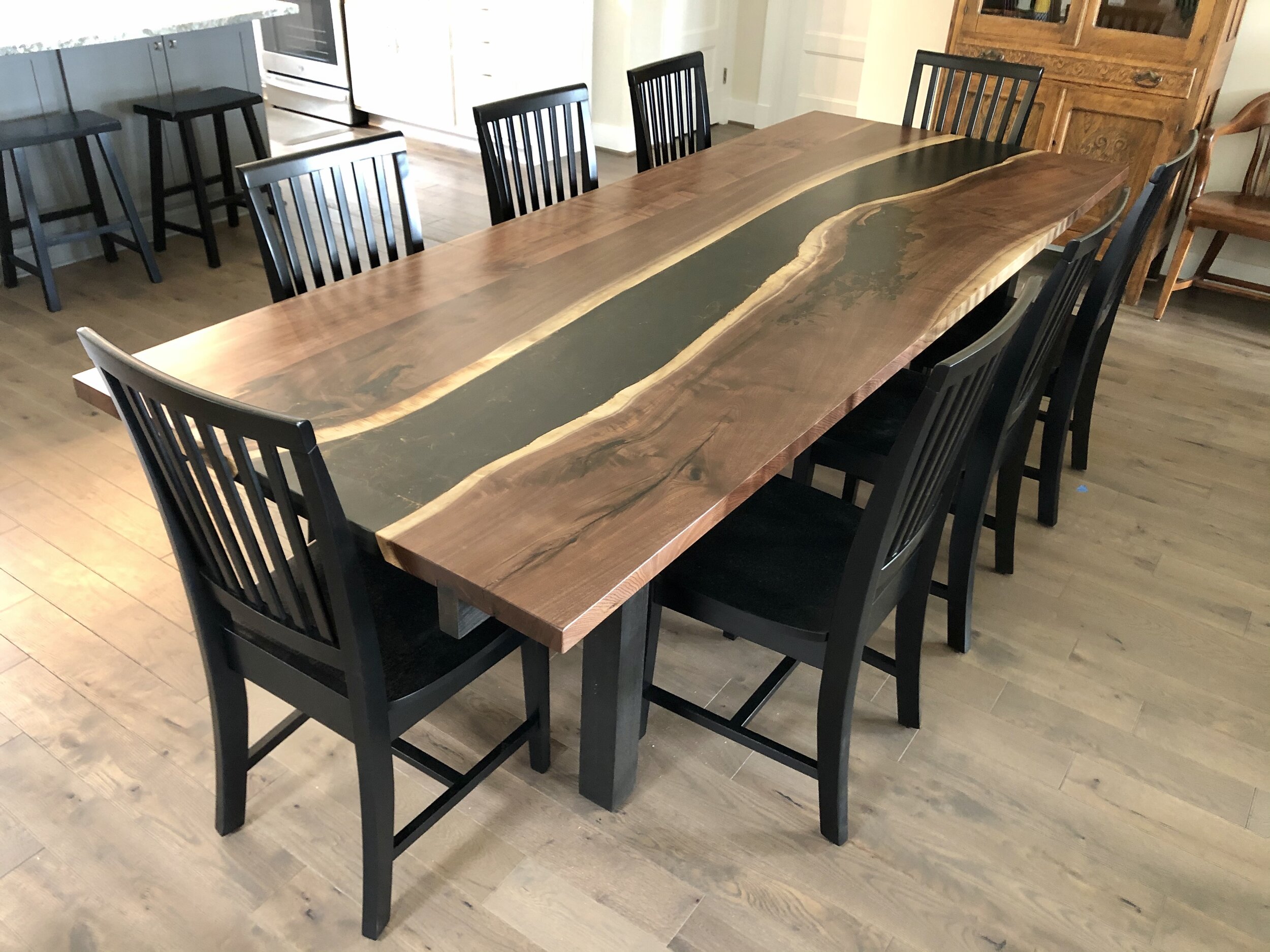 Charcoal and copper walnut river table 