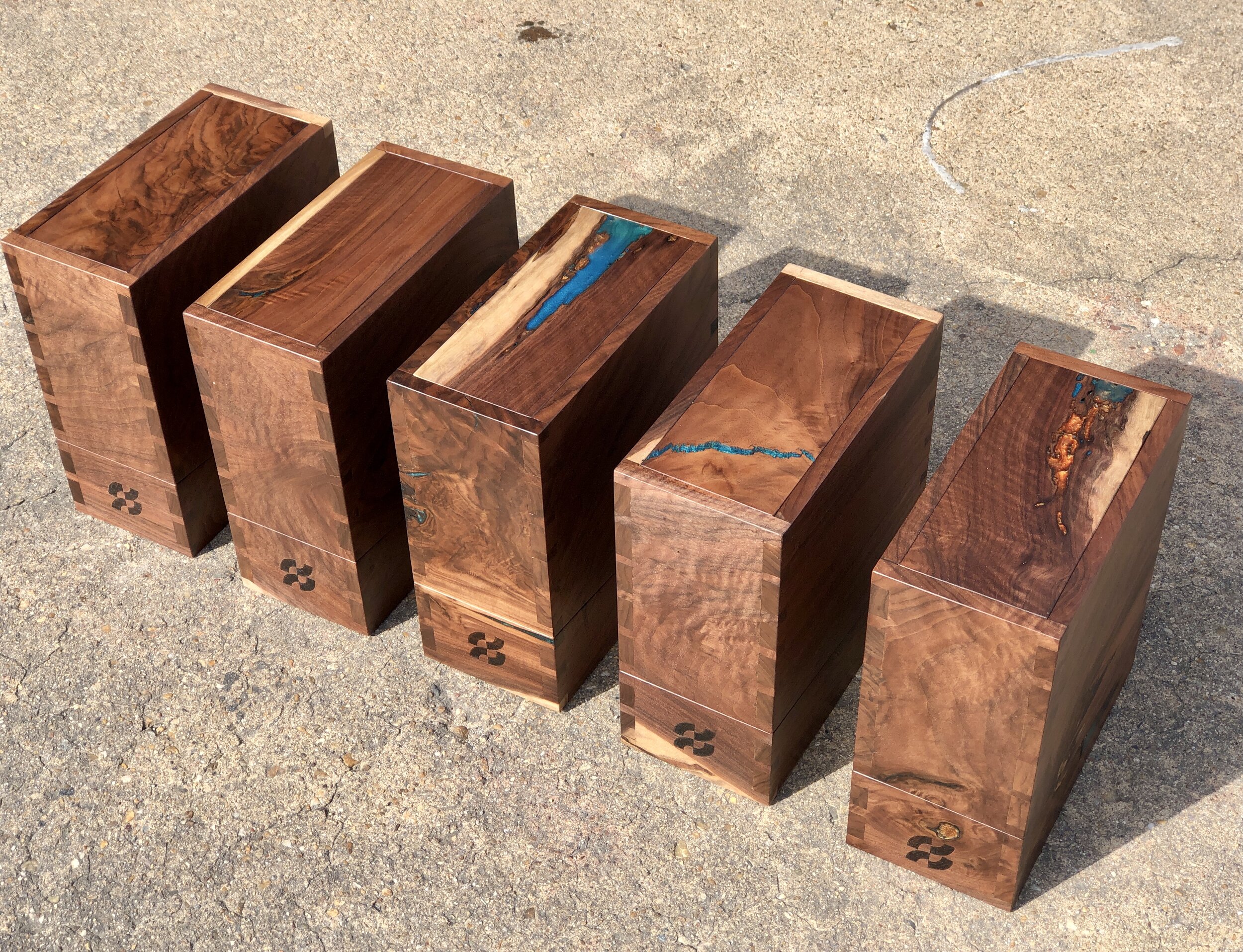 Ferguson Boxes. Sallie Plumley Studio. Richmond Virginia. Walnut curly dovetailed boxes with copper epoxy