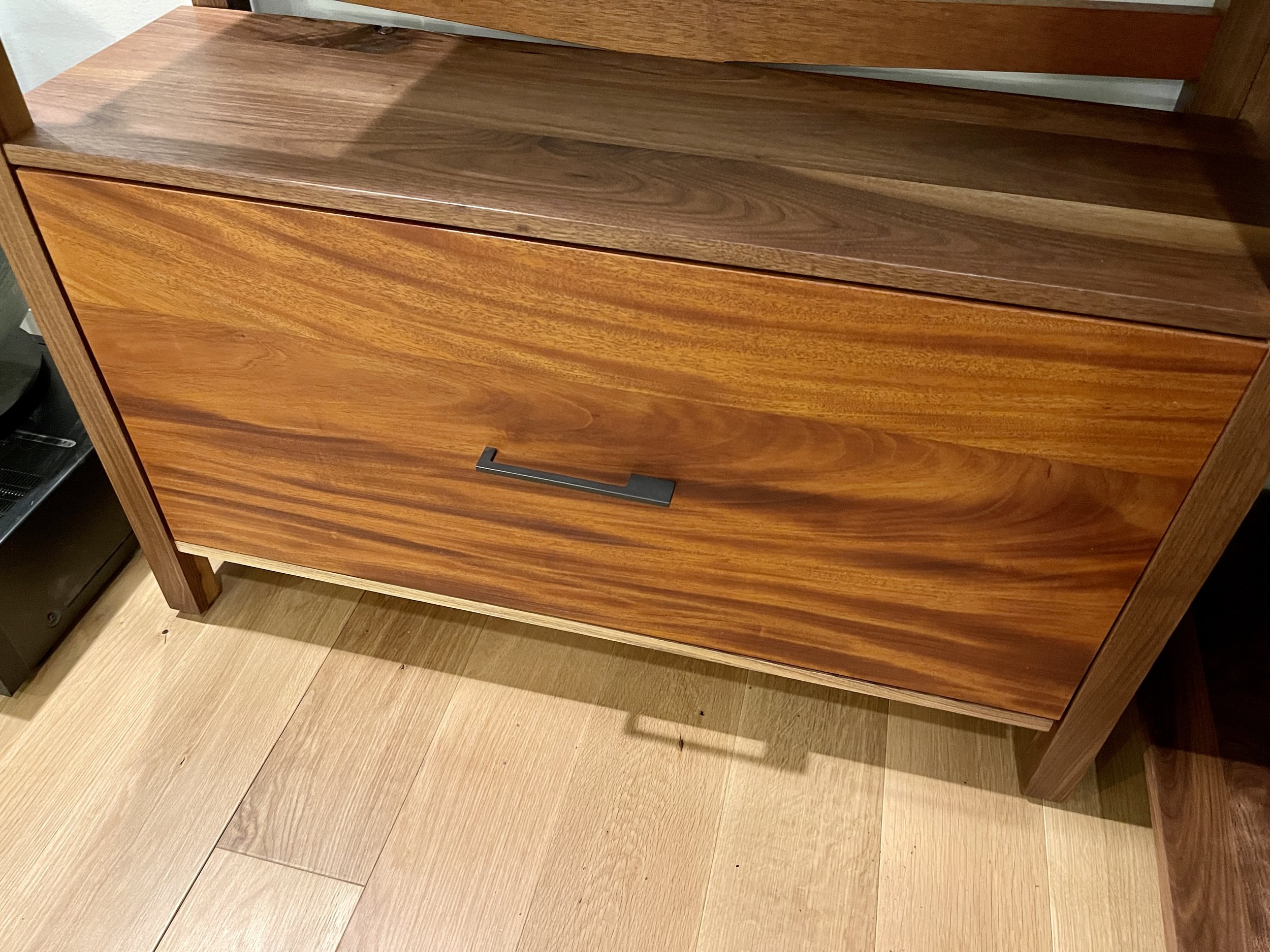 mahogany and walnut corner bookshelf
