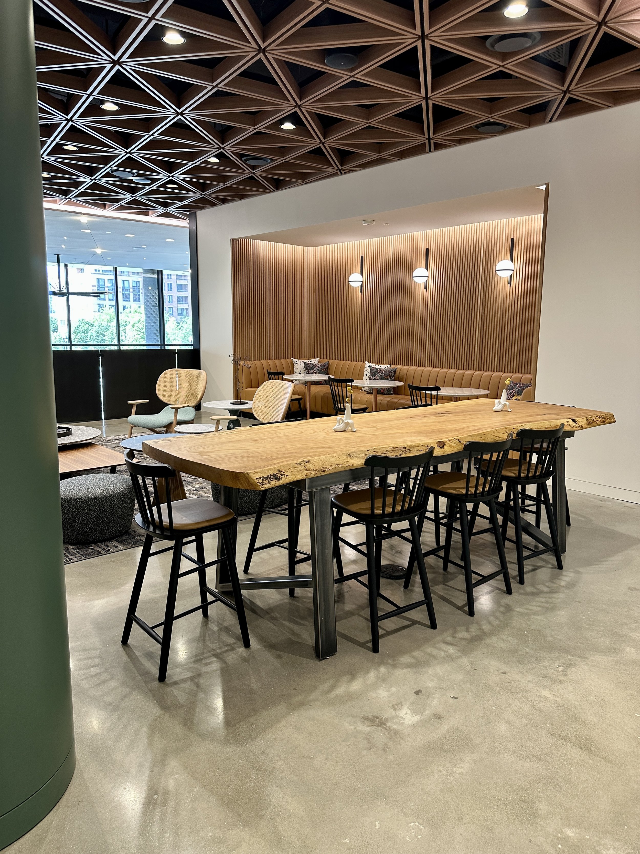 Sallie Plumley Studio. Amazon HQ2 Custom Furniture Installation. Washington DC Arlington Virginia Ash wood live edge slab conference table with metal steel forged base by phoenix handcraft 1