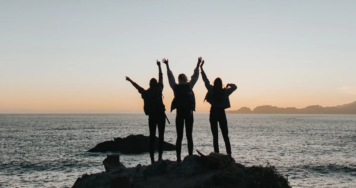 Optimized-three friends rock ocean.jpg