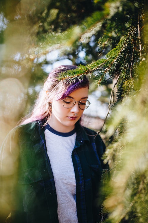 woman with piercing in woods.jpeg