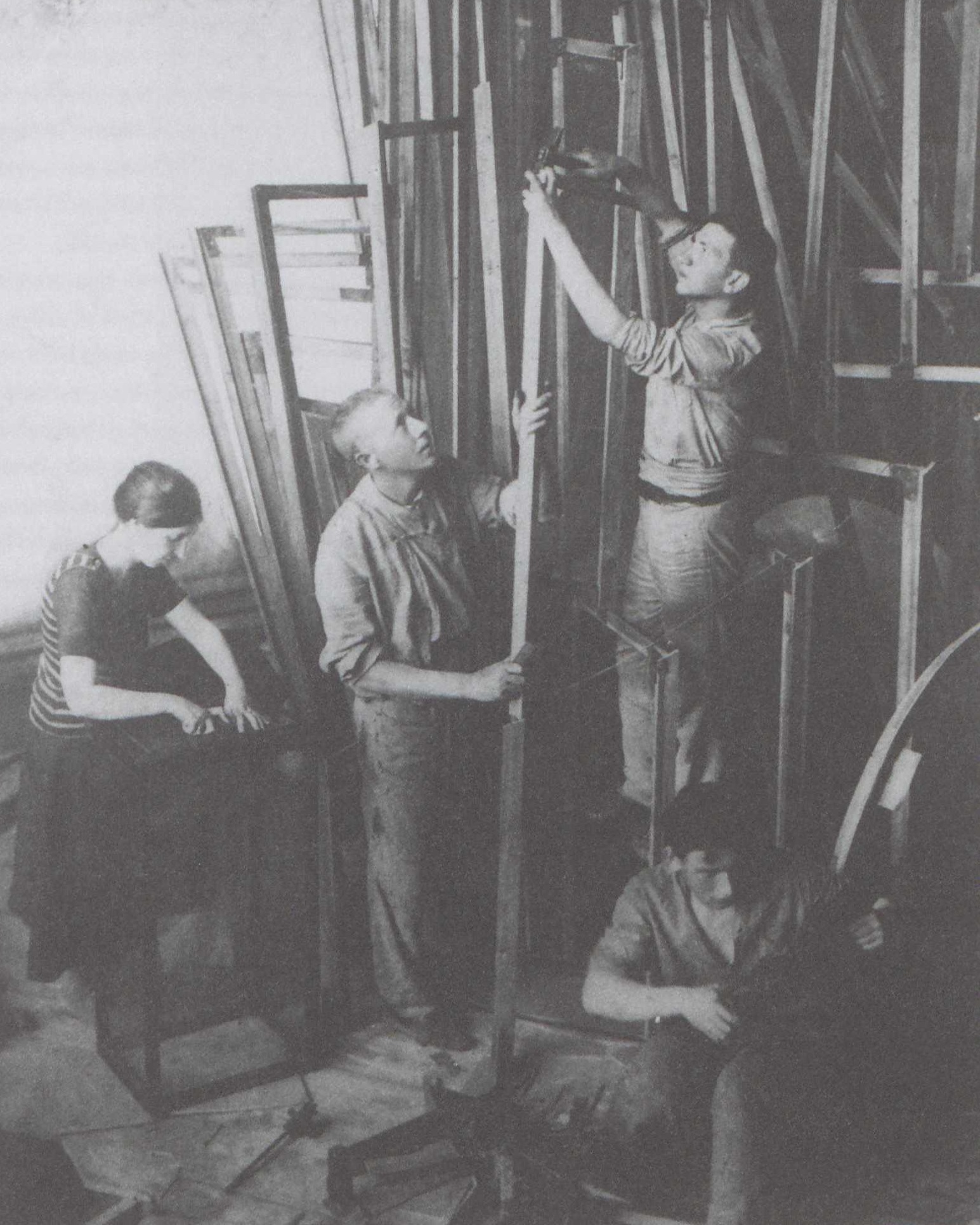 Tatlin working with his assistants to build the first model of the Monument to the Third International , Petrograd, Soviet Union, 1920