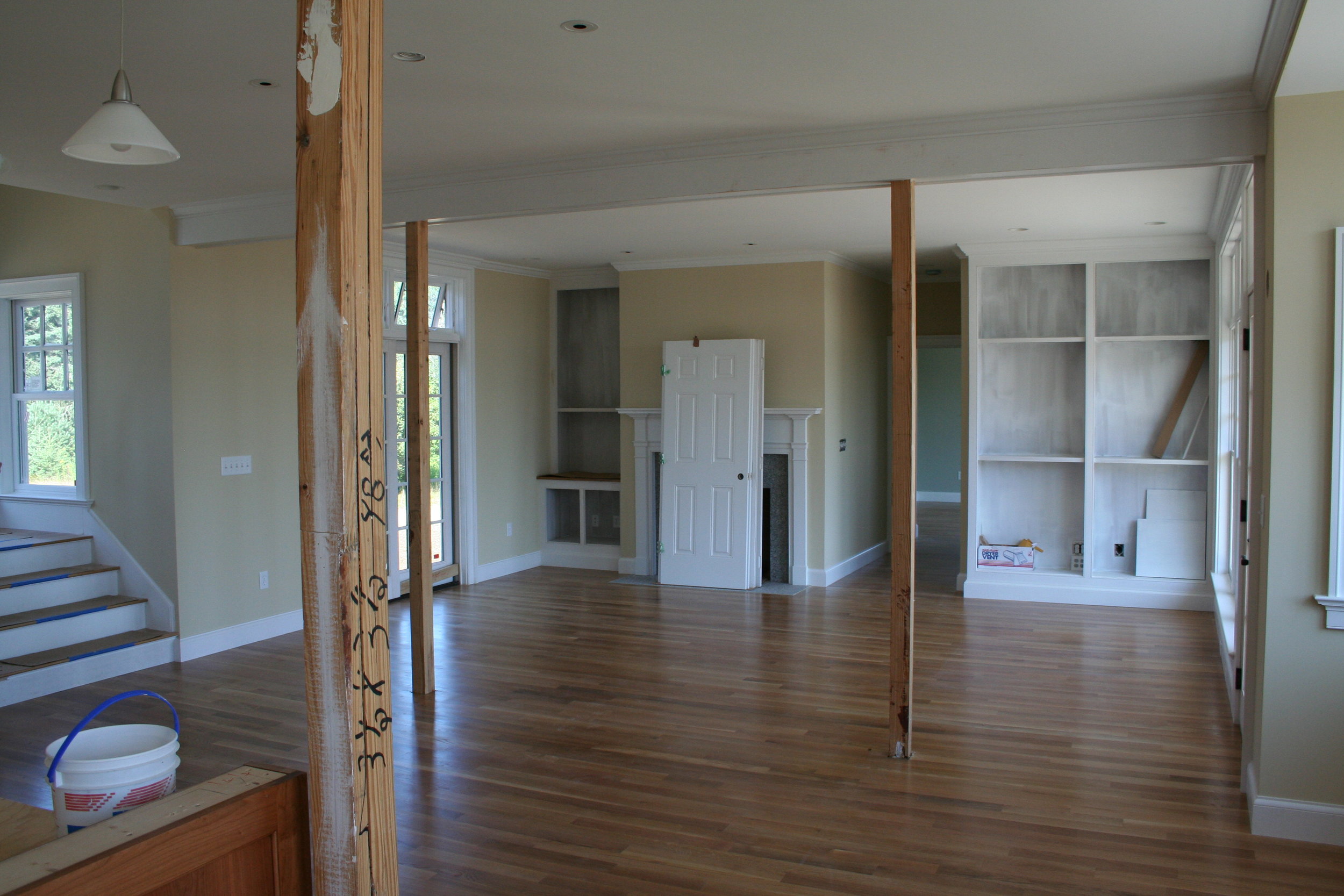  Custom bookshelves and fireplace mantel nearing completion. 