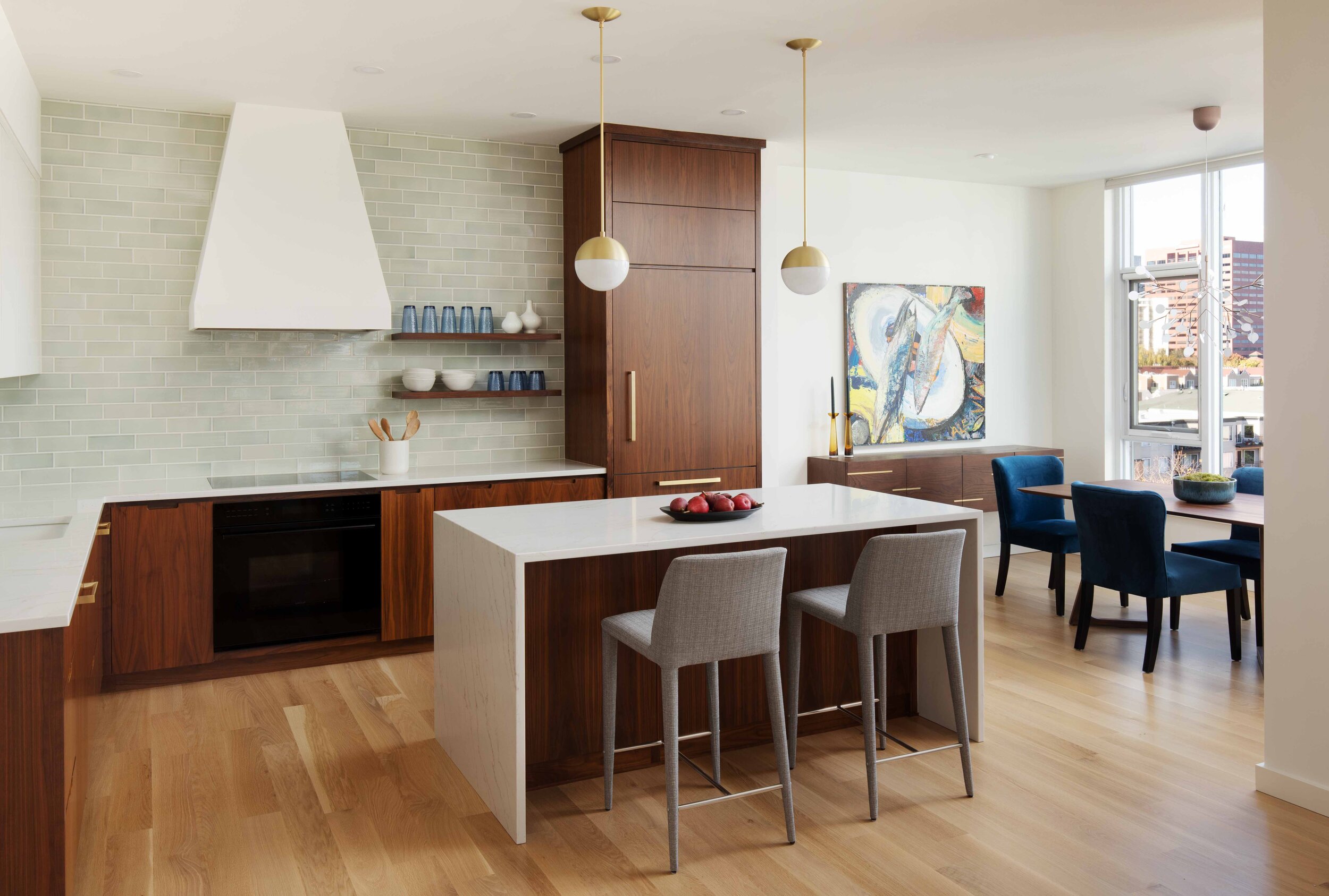 Modern Minimalist Kitchen Remodel in Southwest Portland with walnut cabinets and white countertops