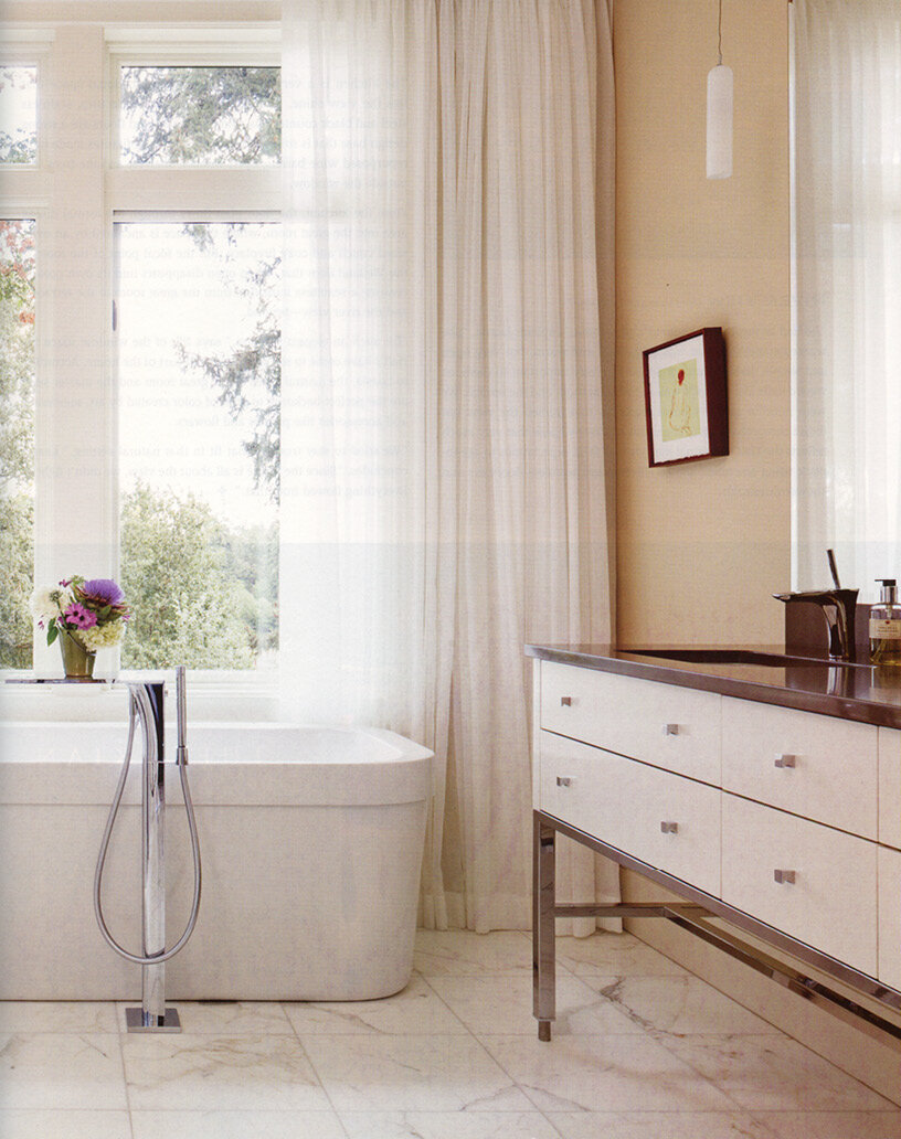 Portrait of Portland riverfront condo floating tub