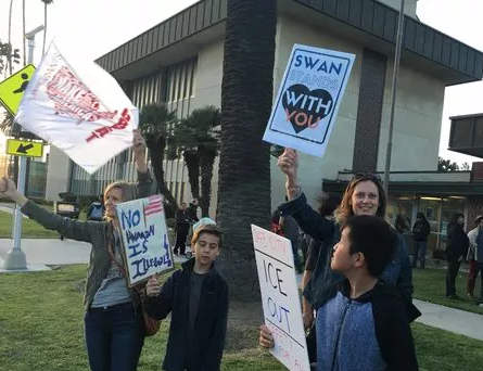 Darlynn Childress, left, and Danielle Walsmith, co-founders of Suburban Women's Advocacy Network, participate in a "safe city" rally March 7 at Oxnard City Hall. (Photo: AMANDA COVARRUBIAS/THE STAR)