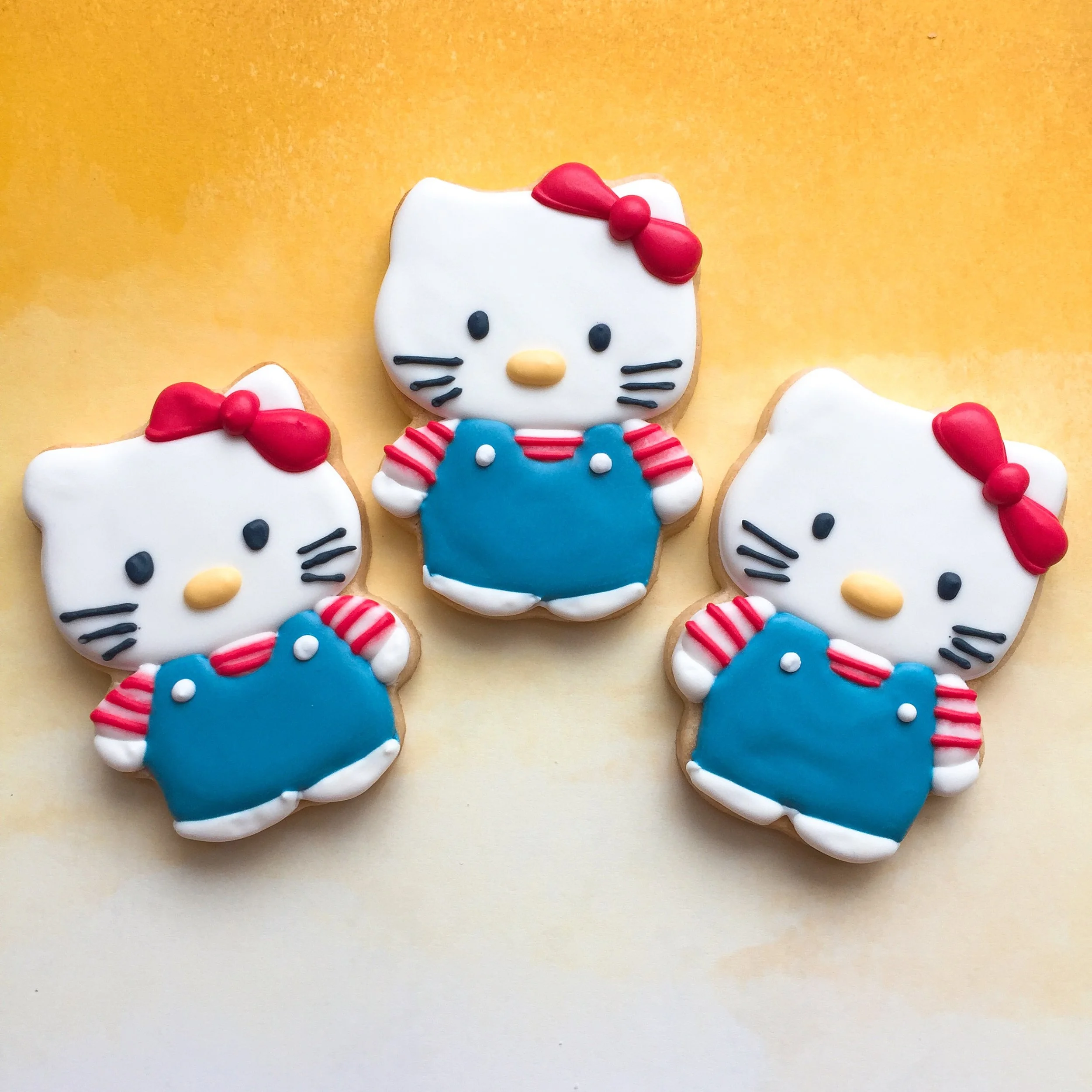 Hello Kitty in Overalls