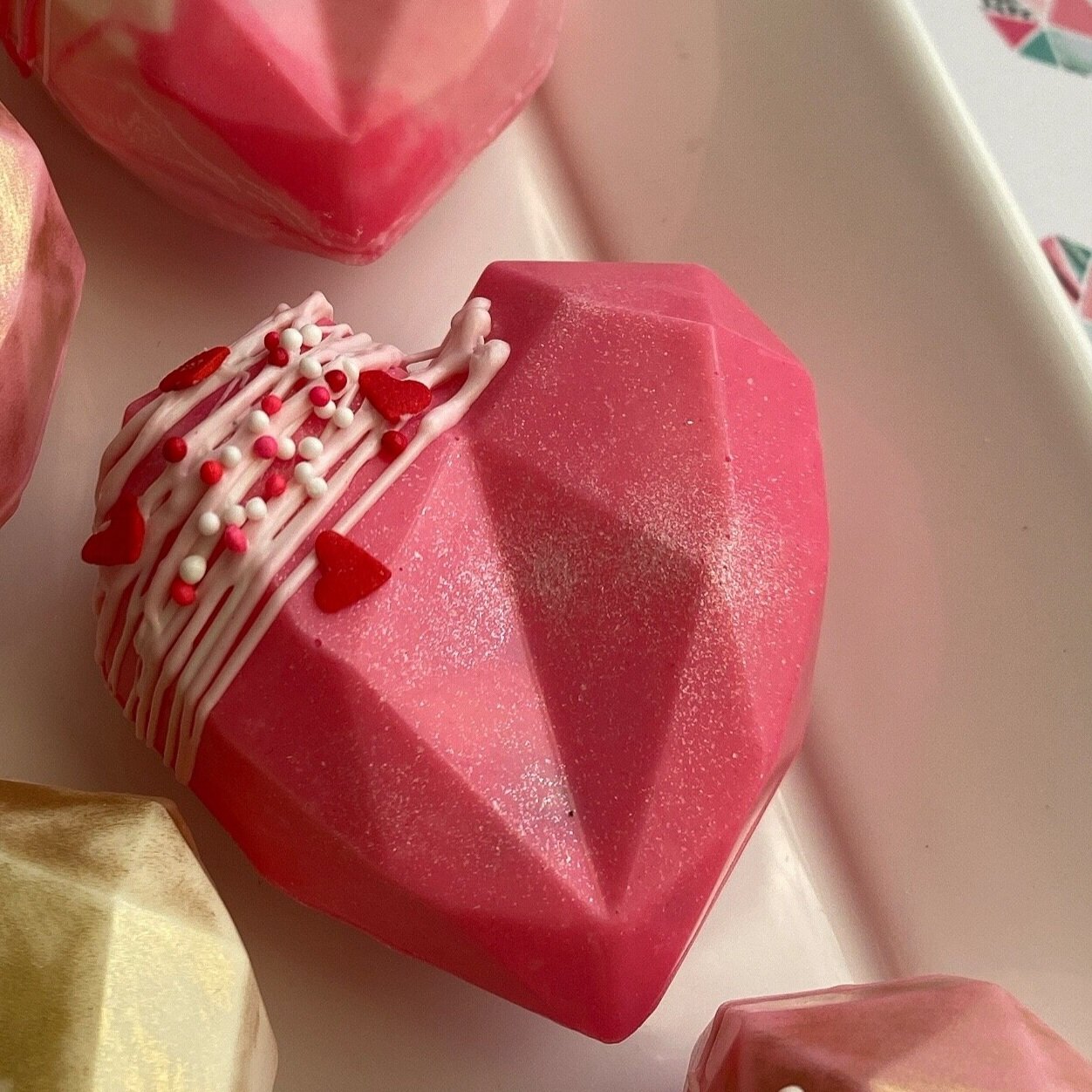 Dark Pink Sparkle Heart Mocha Bomb with rainbow marshmallows