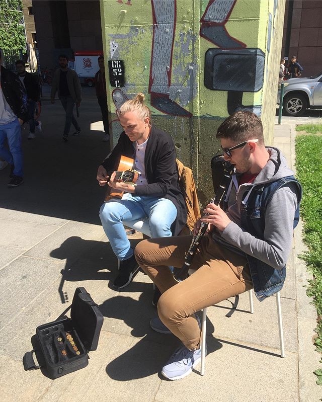 Yesterday part 2: under the bridge. @dmitry.kuptsov and Vlad pumping out some tunes in the midst of traffic and class change at 2.30pm. #jazzmanouche #streetperformance #freeconcert #gypsyjazz #workingthestreets #streetfood #satesake