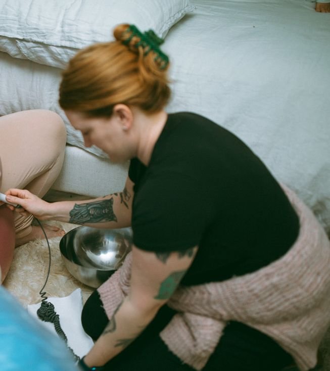 midwife checking a pregnant woman
