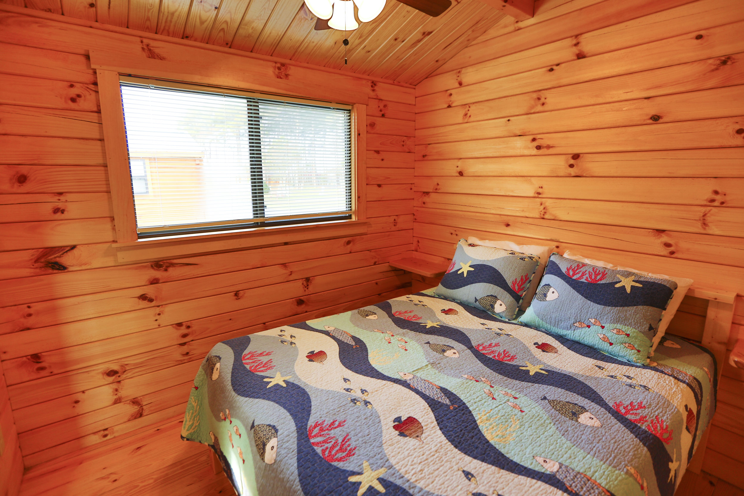 Lakefront Cabins Master Bedroom | Treasure Beach