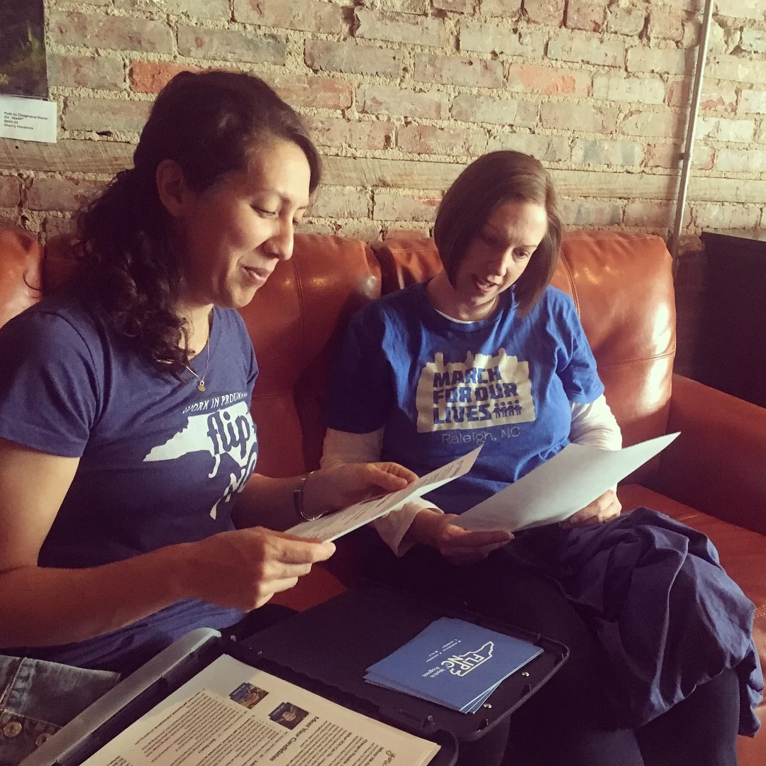 Kumi (left) with fellow FLIPster Michelle Craig at a recent Wake County canvass.
