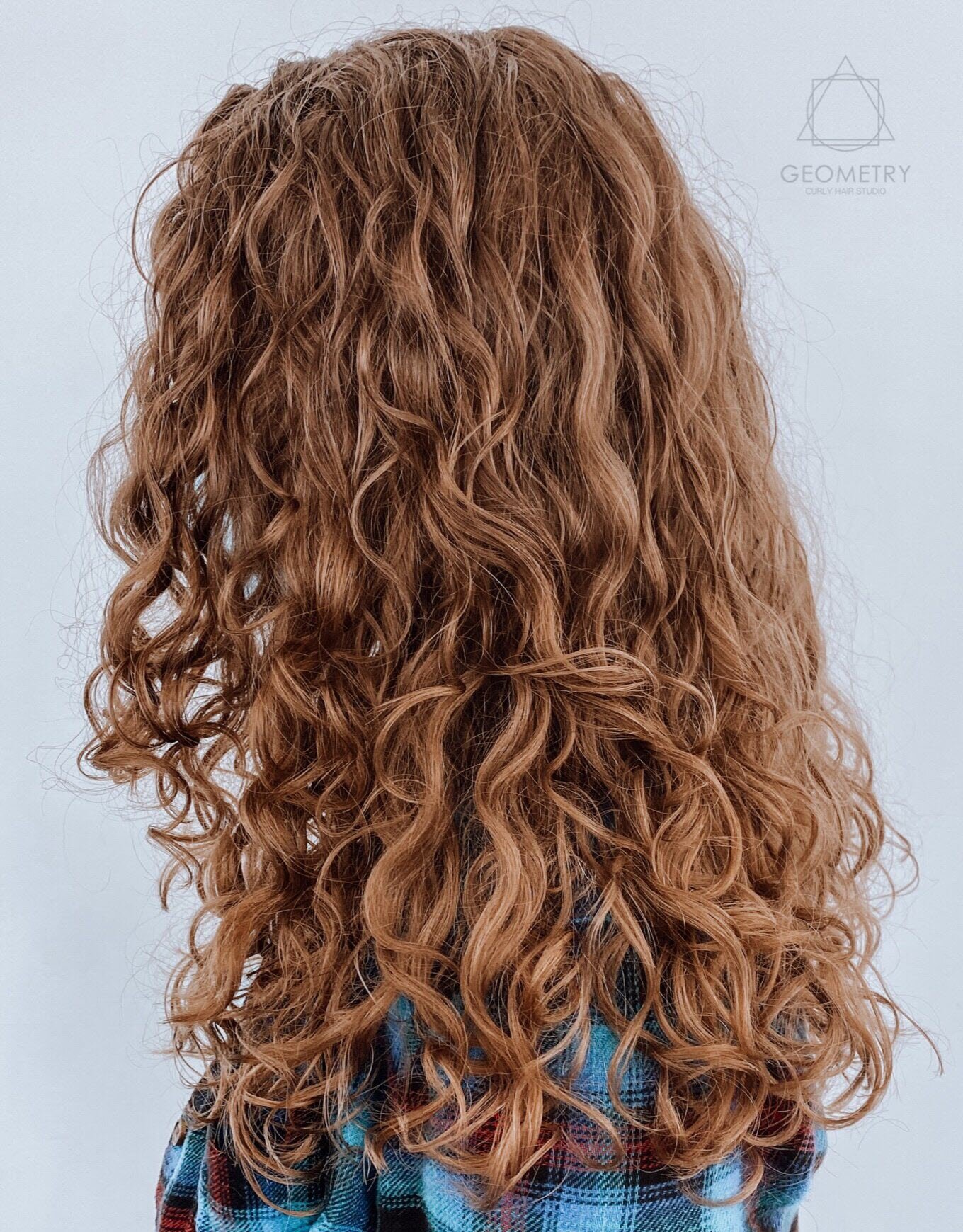 Natural auburn wavy hair cut and color