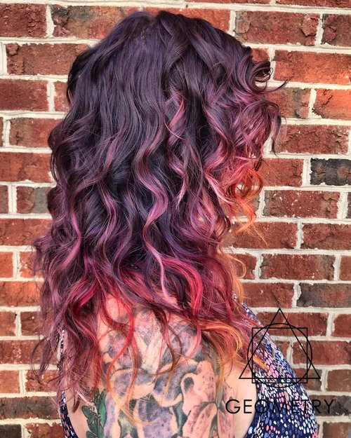 Purple red orange colormelt on natural wavy hair