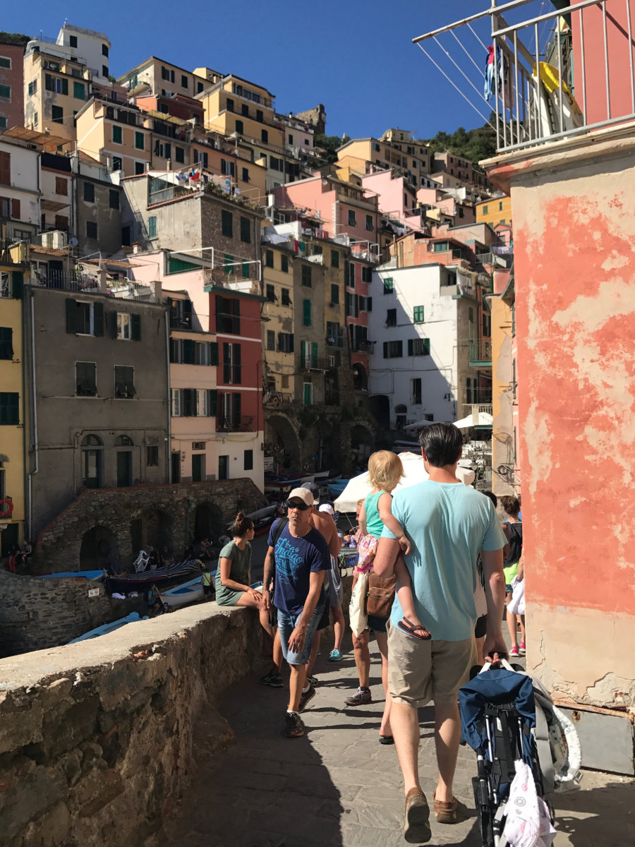 Carrying the stroller around Riomaggiore.