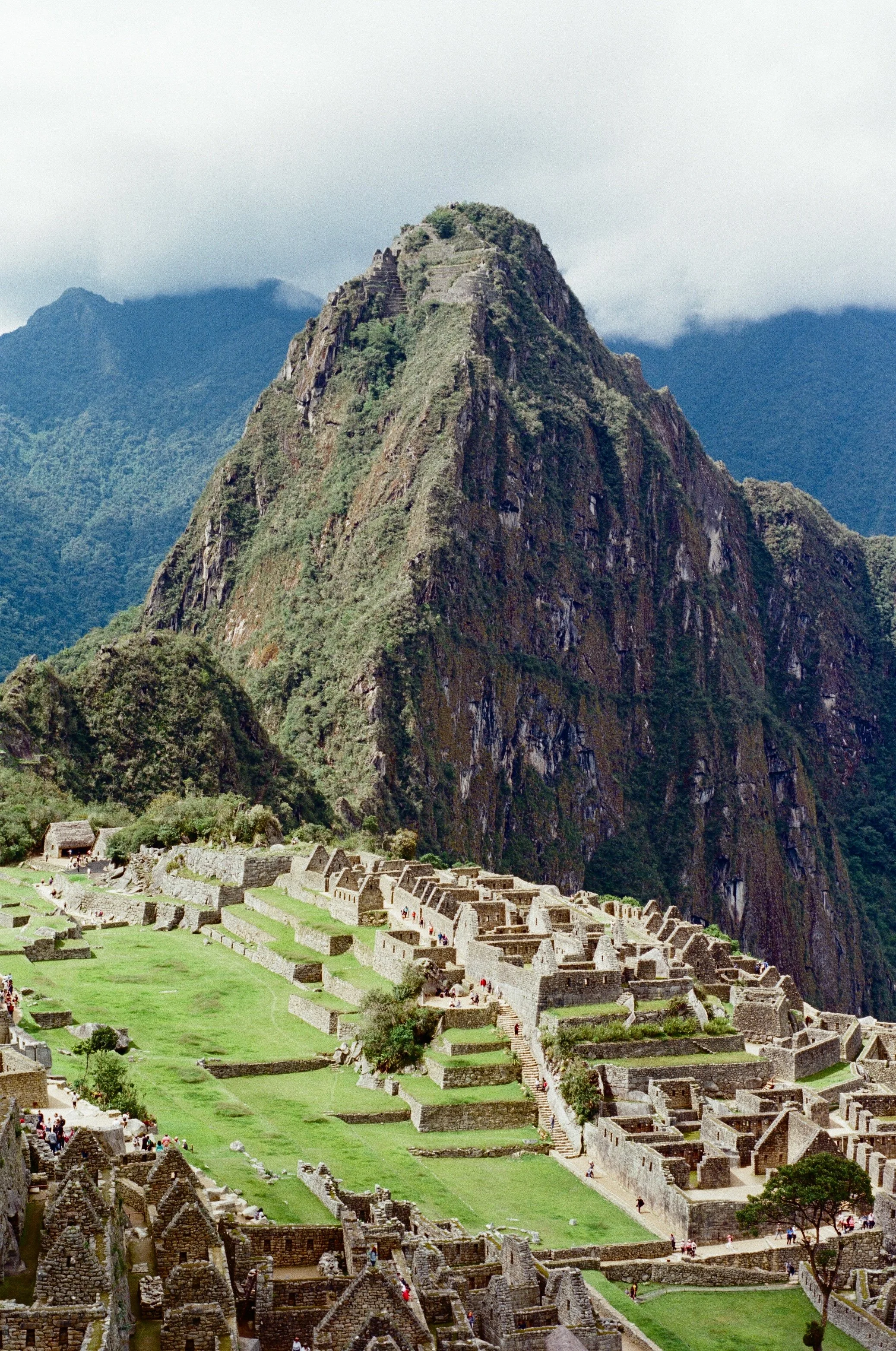 Charlie Michael Photography | Award Winning City Photography | LinkedIn | BCG | 35mm Kodak Portra 400 Nikon | View over machu picchu with the towering huyana picchu behind no tourists in sight.jpg