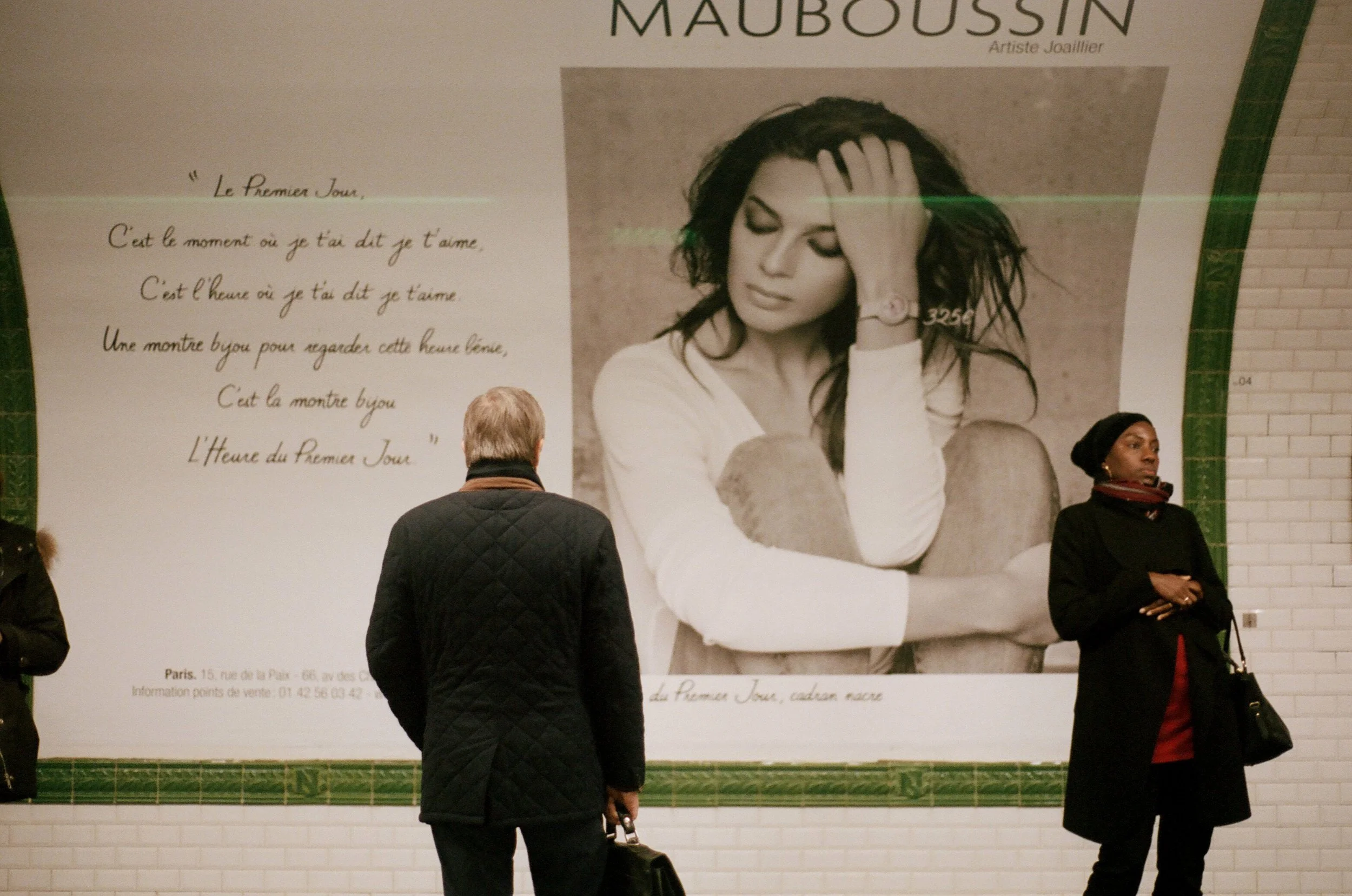 Charlie Michael Photography | Award Winning City Photography | LinkedIn | BCG | 35mm Kodak Portra 400 Nikon | Paris Metro advertising person looking street photography in europe.jpg