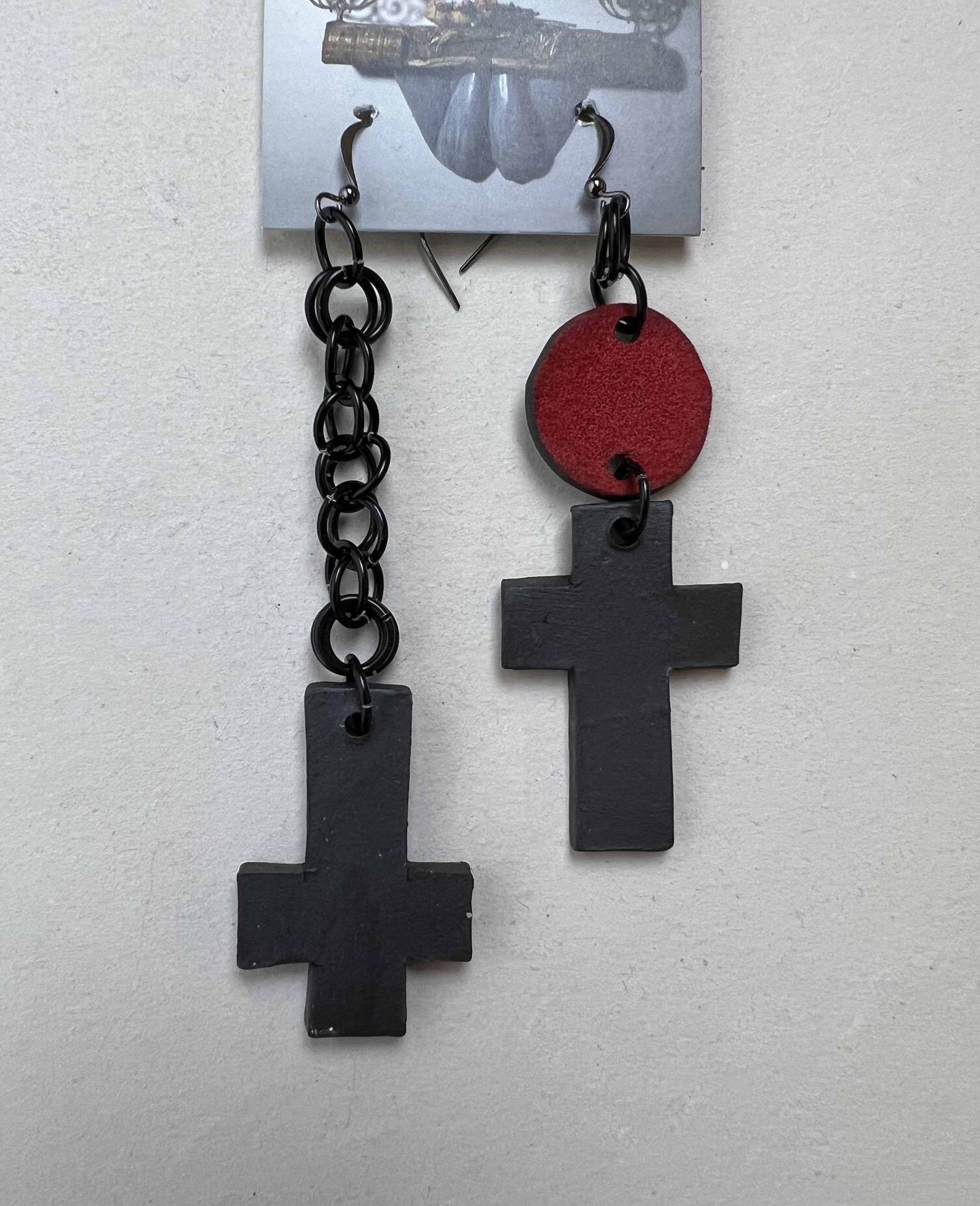 cross asymmetrical dangle earrings 