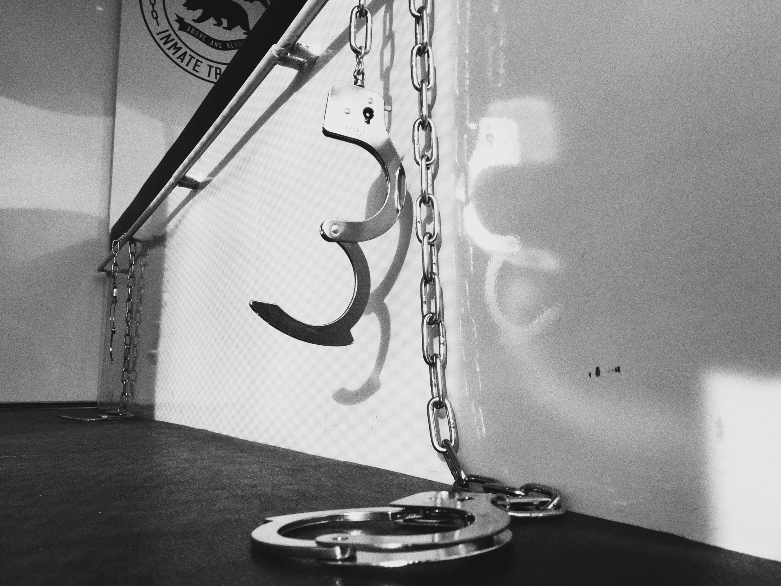 Handcuffs dangle from the bench inside of the escape truck