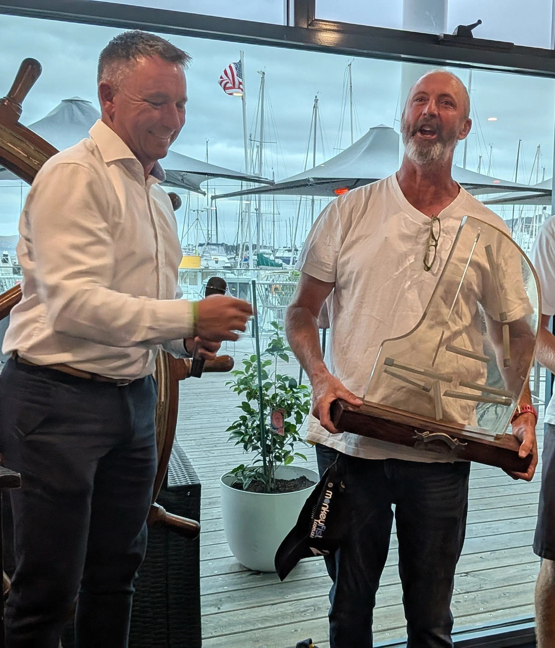 ILCAWA President Mike McAullay, receiving the Battens Trophy