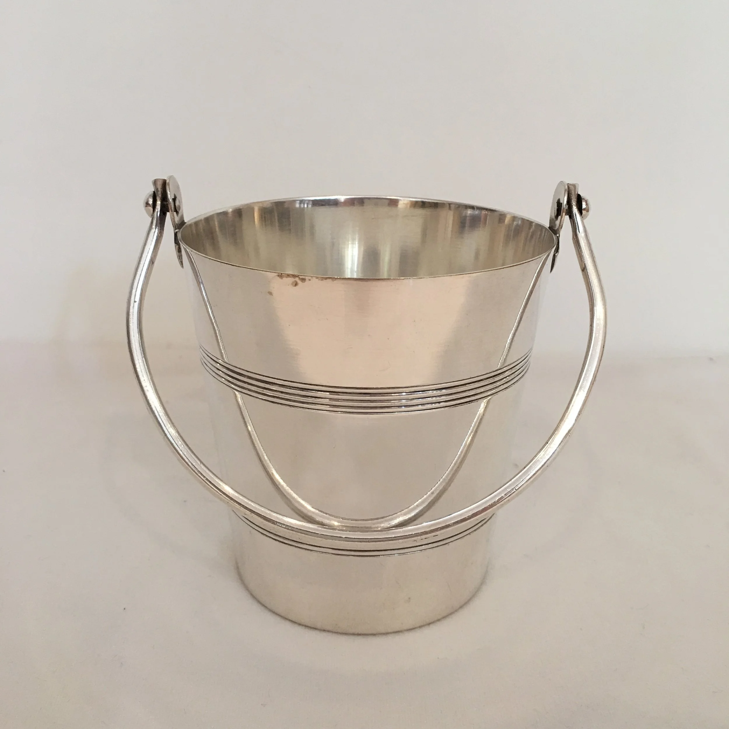 Ice bucket with single handle, silver plated