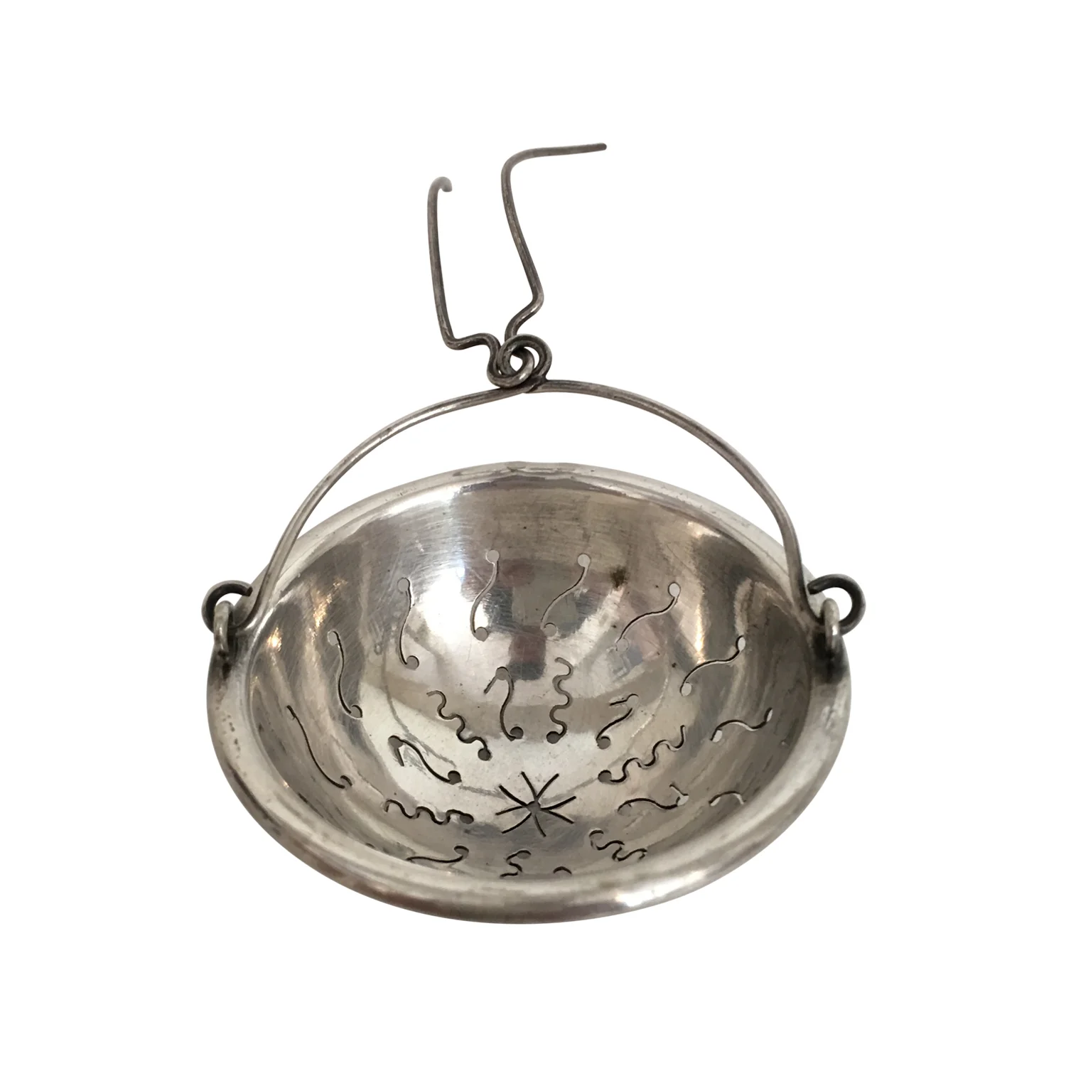 Tea strainer in a basket shape with hanging handle, silver plated France