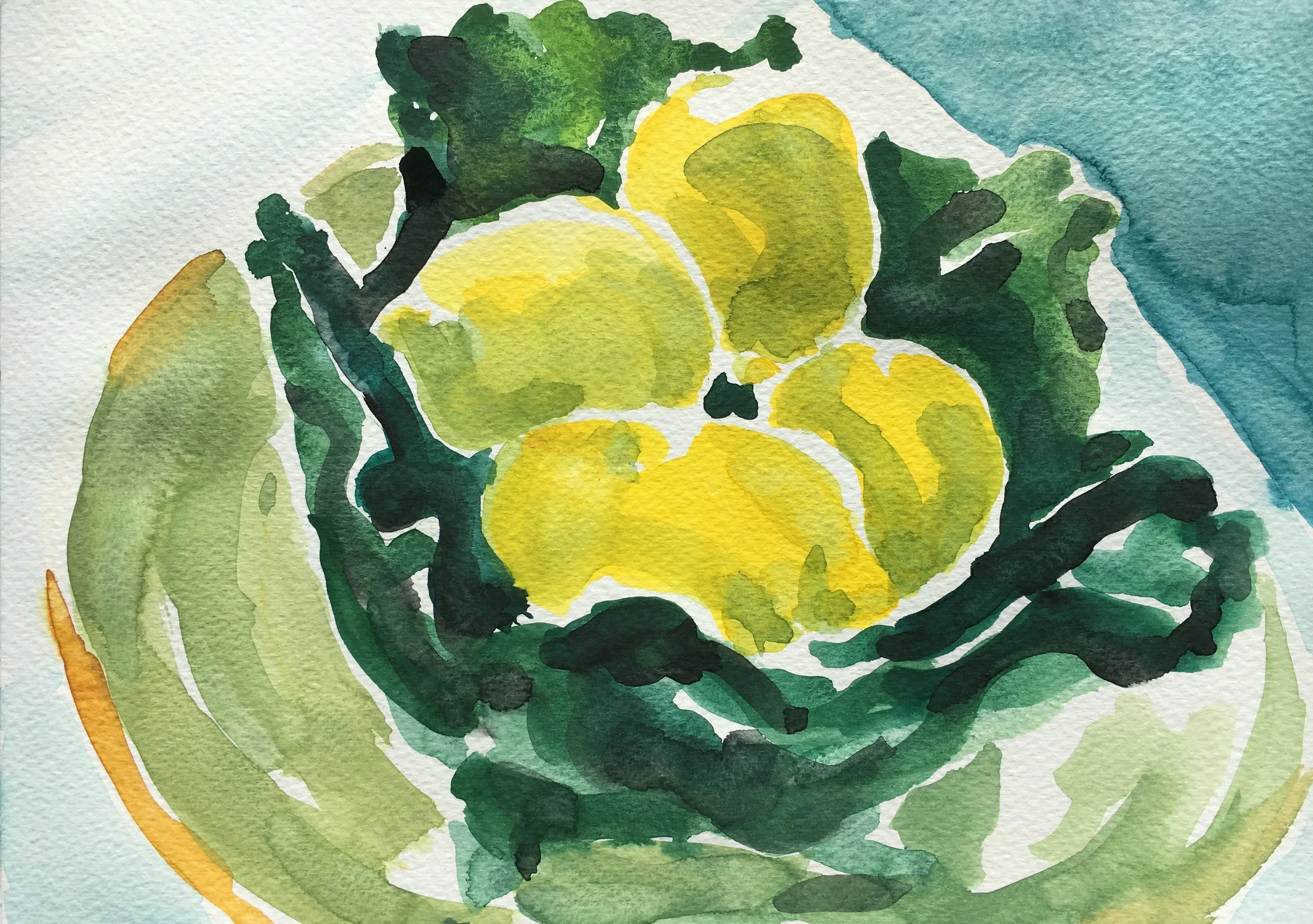 Lemons in a green bowl