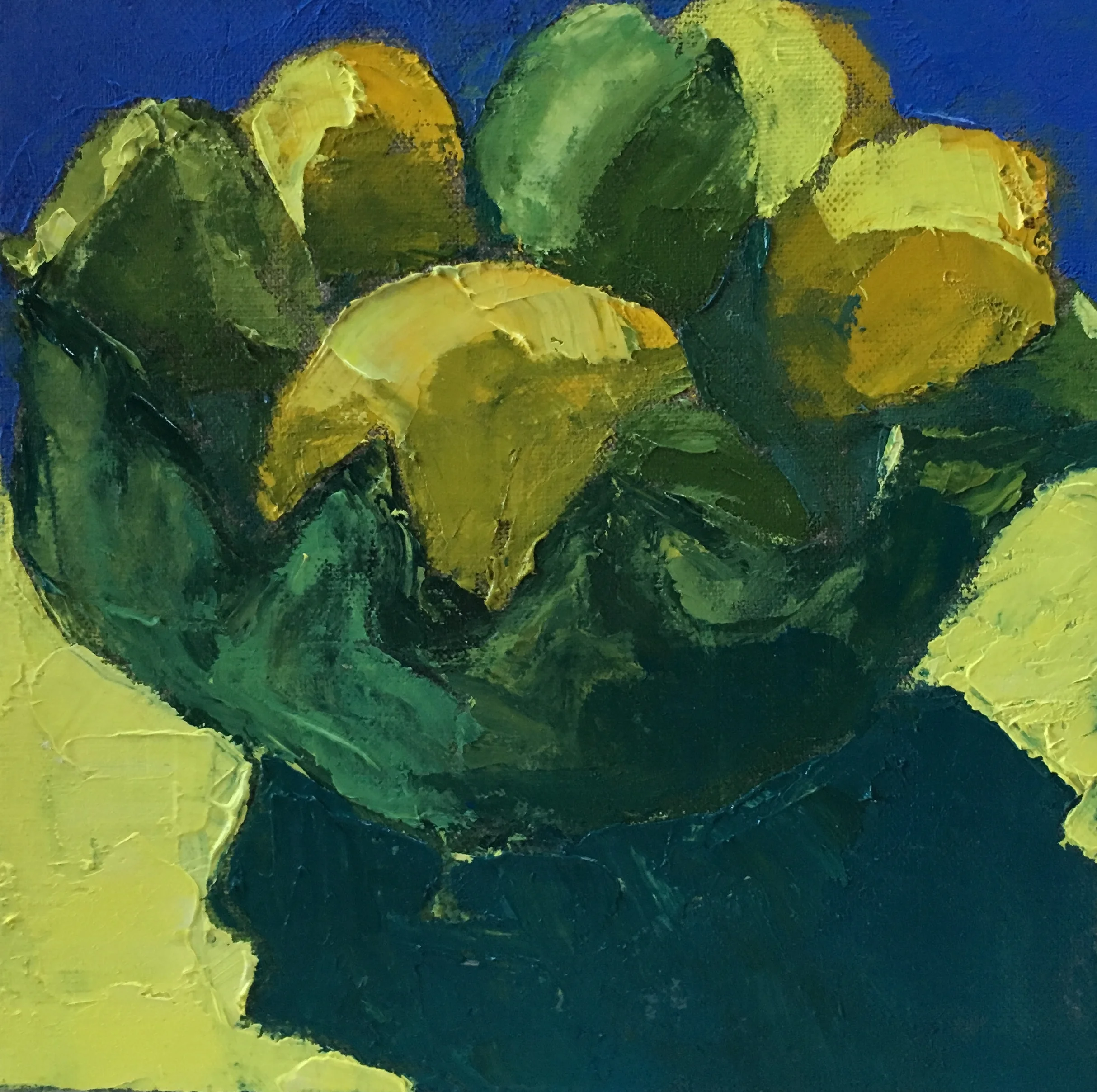 Lemons in a green bowl