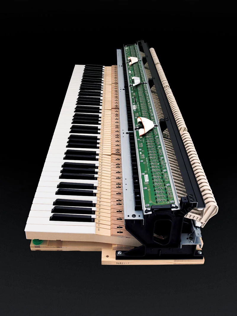 A perfect touch: Grand Hybrids use wooden keys and real, moving hammers.