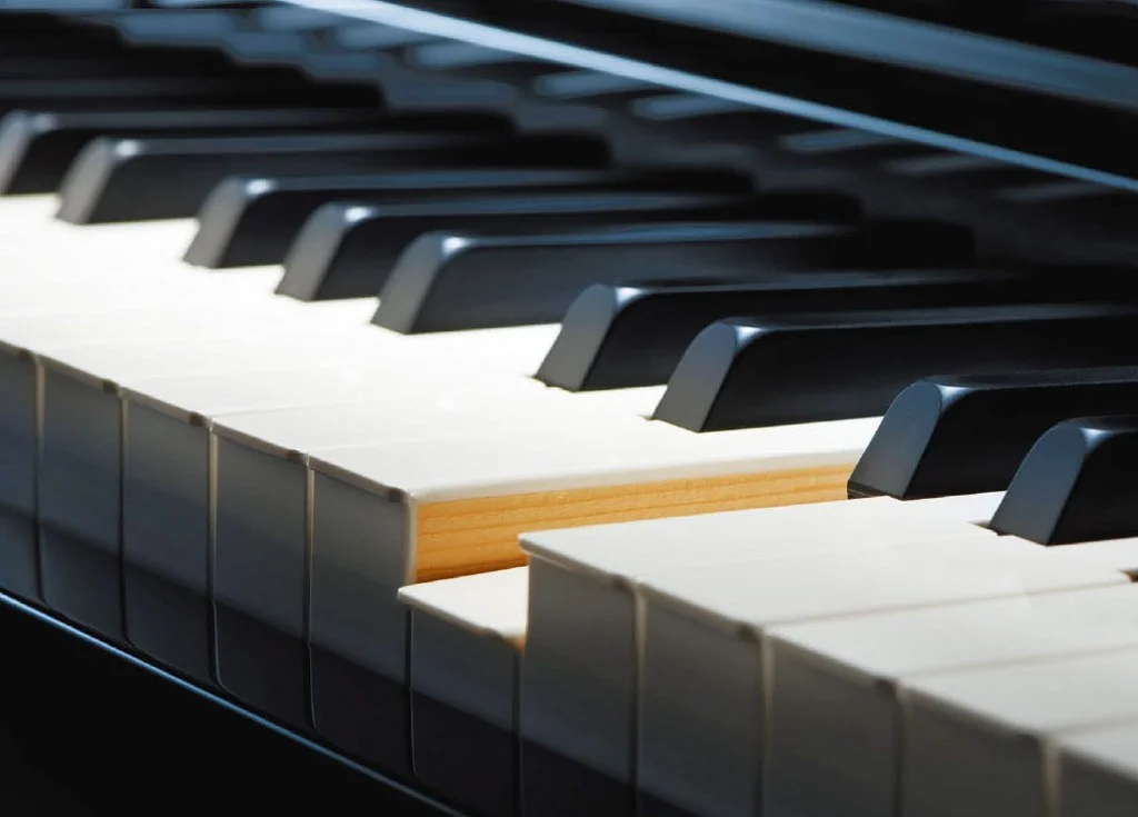 Hybrid pianos have full-length, wooden keys