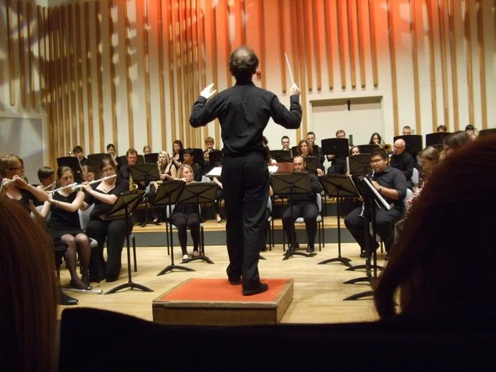 Conducting Manchester University Wind Orchestra (July 2011).jpg