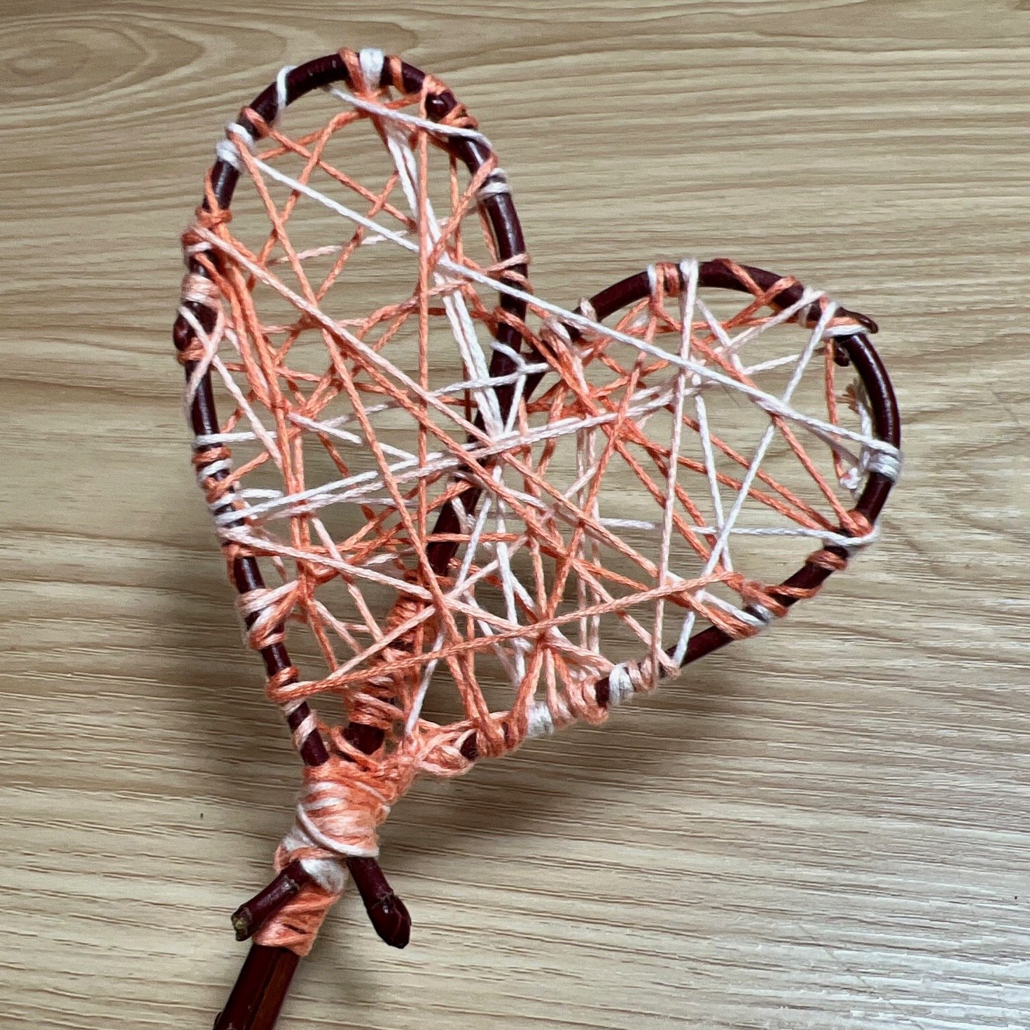 Make a heart-shaped stick wand - Mud & Bloom